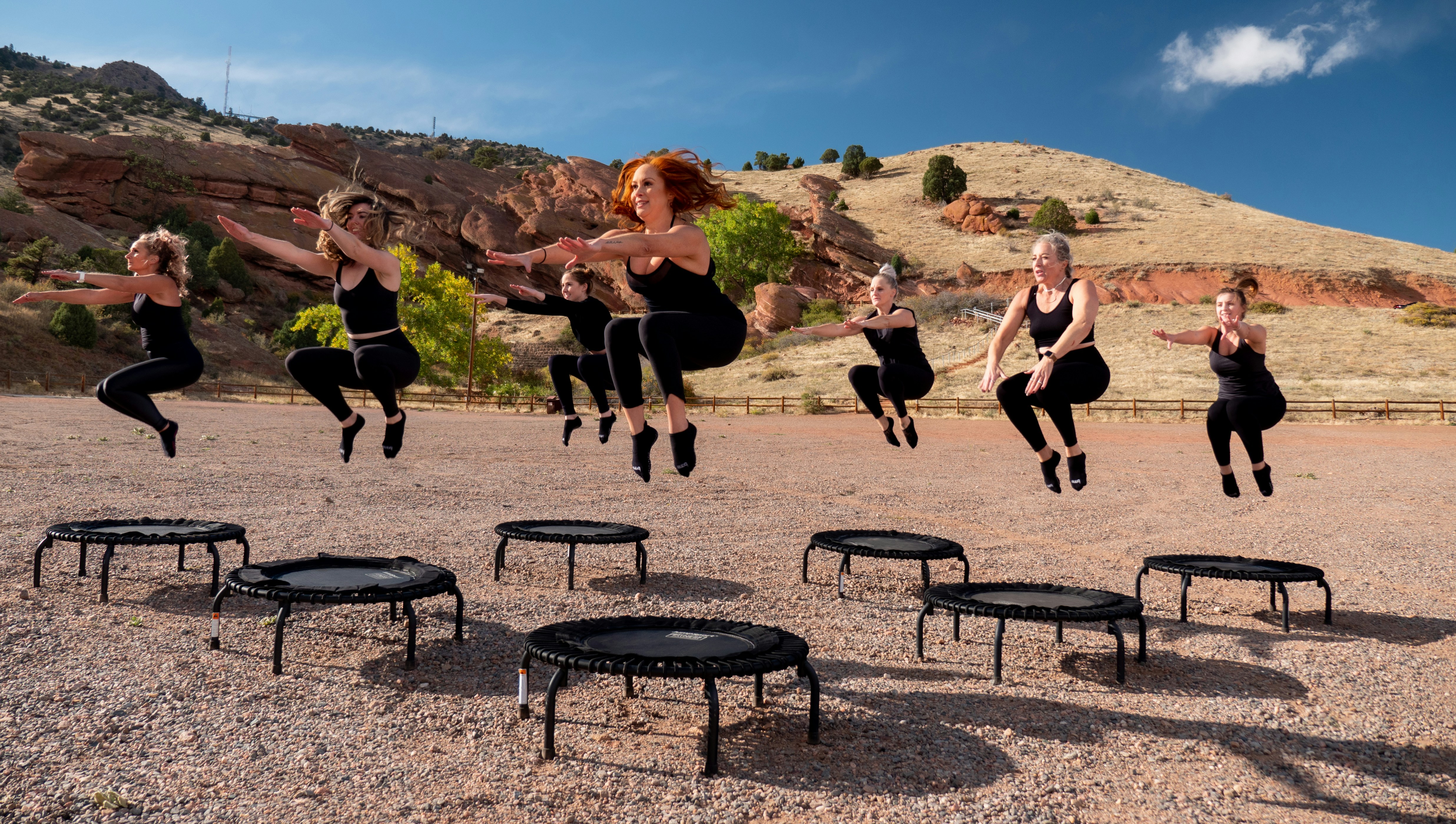 women jumping on trampoline